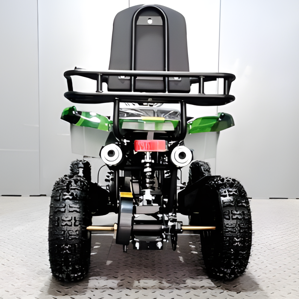 Small ATV or quad bike with a black seat and green sides on a white background
