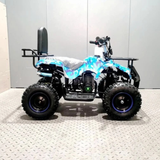 Quad bike with blue and white camouflage design on a gray floor.