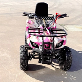 Pink and white quad bike on a paved surface