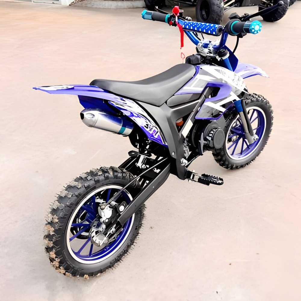 Small dirt bike with blue and black design on a light background