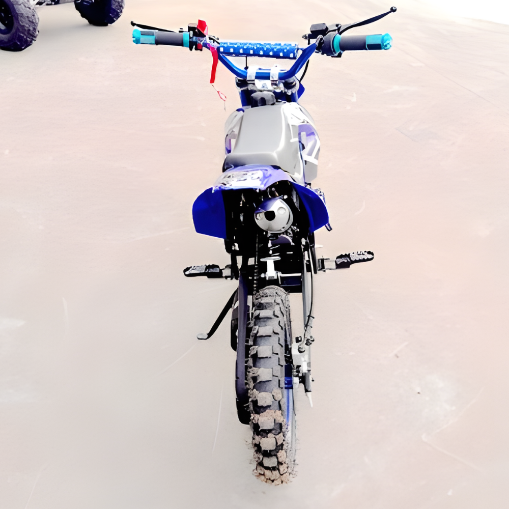 Small dirt bike on a sandy surface