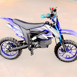 Blue and black dirt bike on a beige background