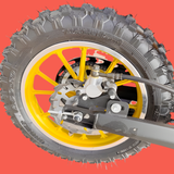 Close-up of a motorcycle wheel with a red background