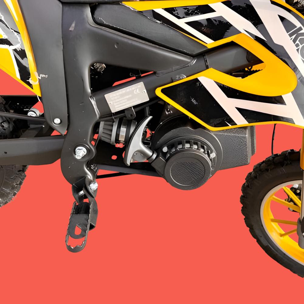 Close-up of a motorcycle's suspension system on a red background
