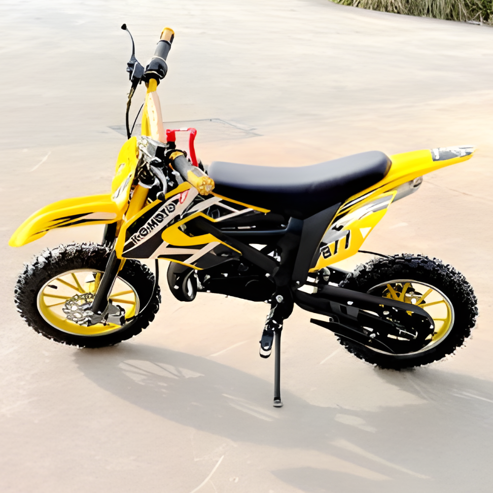 Yellow and black dirt bike on a sandy surface