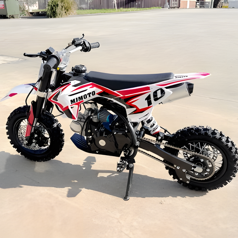 Small dirt bike with 'Mimoto' branding on a paved surface