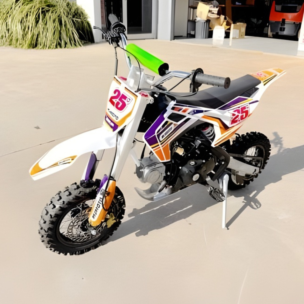 Colorful dirt bike with number 25 on a concrete surface
