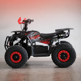 Black and red ATV on a gray surface with a gradient background
