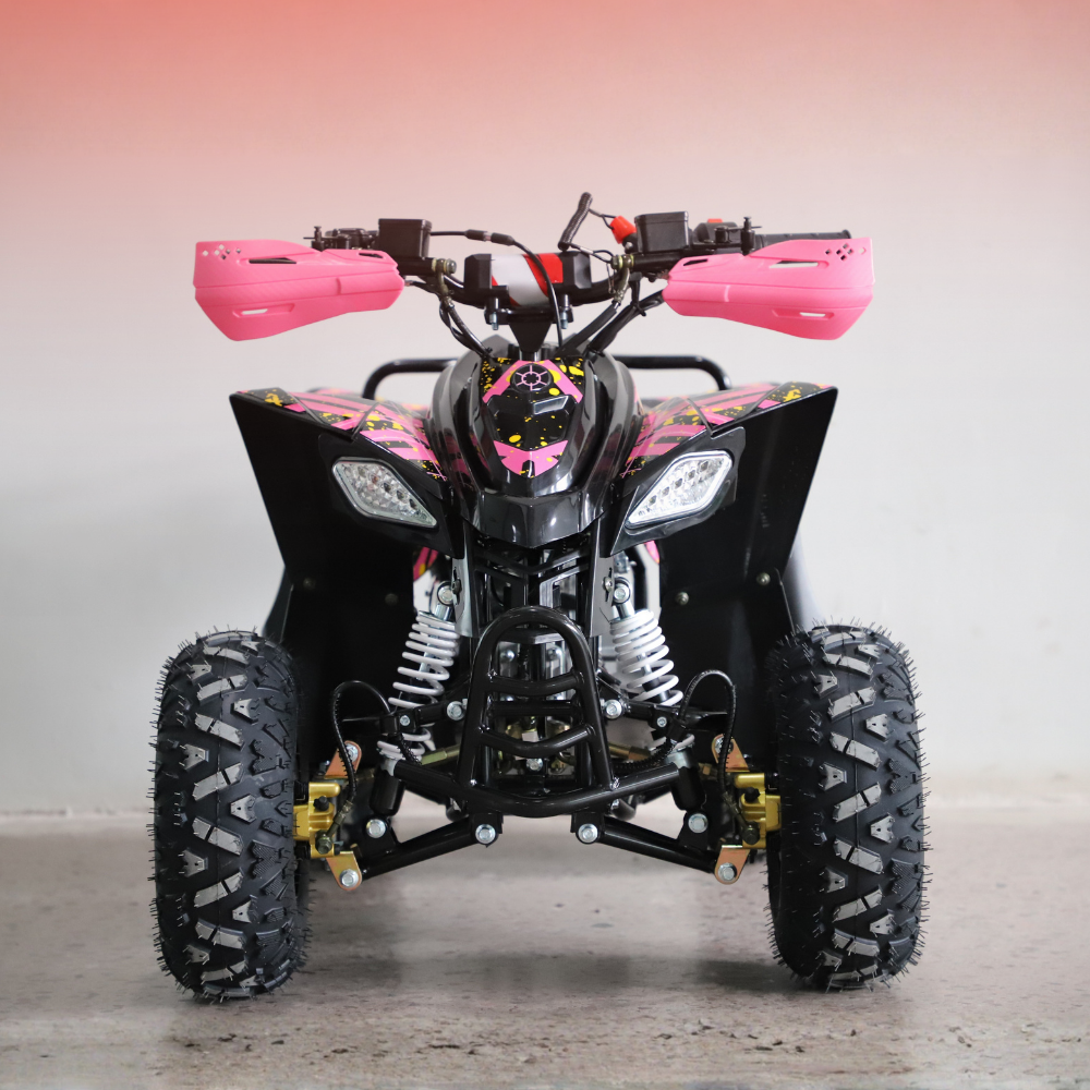 A black quad bike ATV with bright pink hand grips and pink graphic decals, photographed from the front against a neutral studio backdrop.