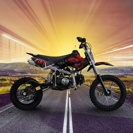 Motorcycle on a road with a sunset background