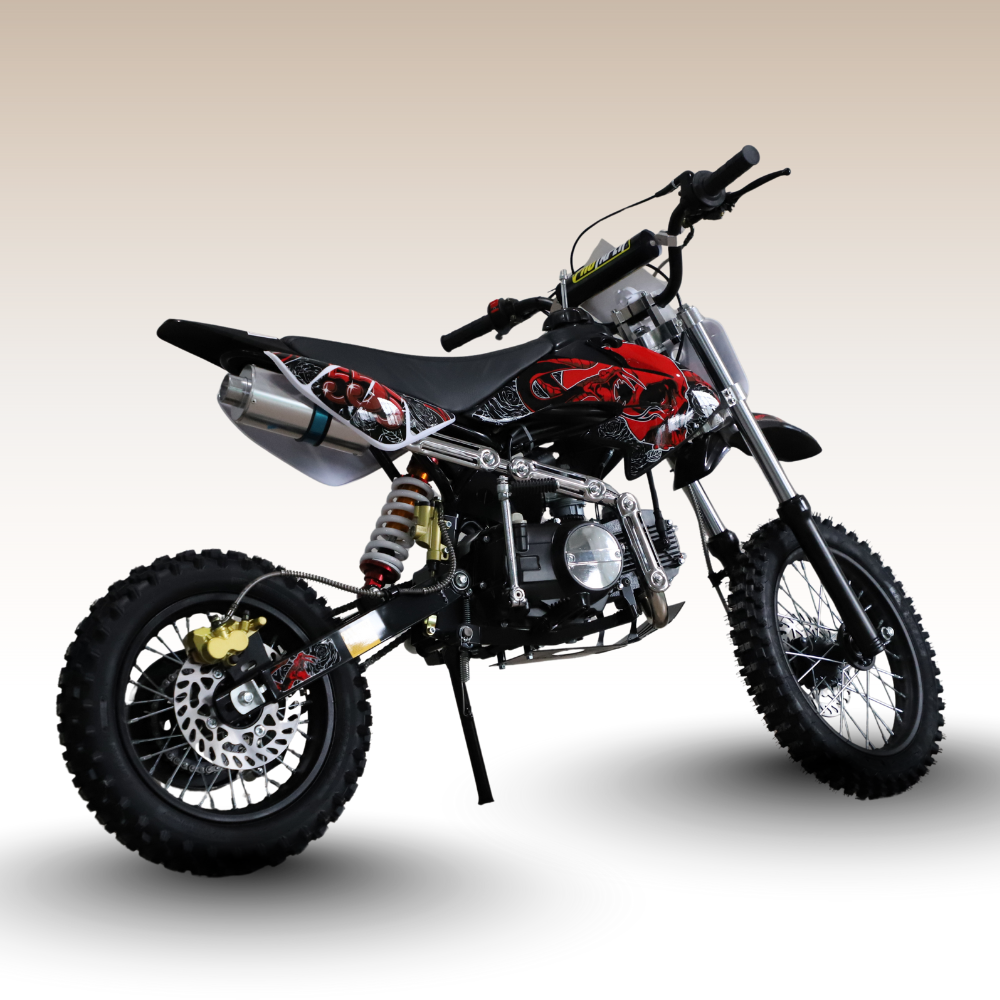 Small dirt bike with red and black design on a light gray background