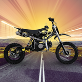 Motorcycle on a road with a colorful sky and landscape in the background