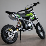 Green and black dirt bike on a gray background