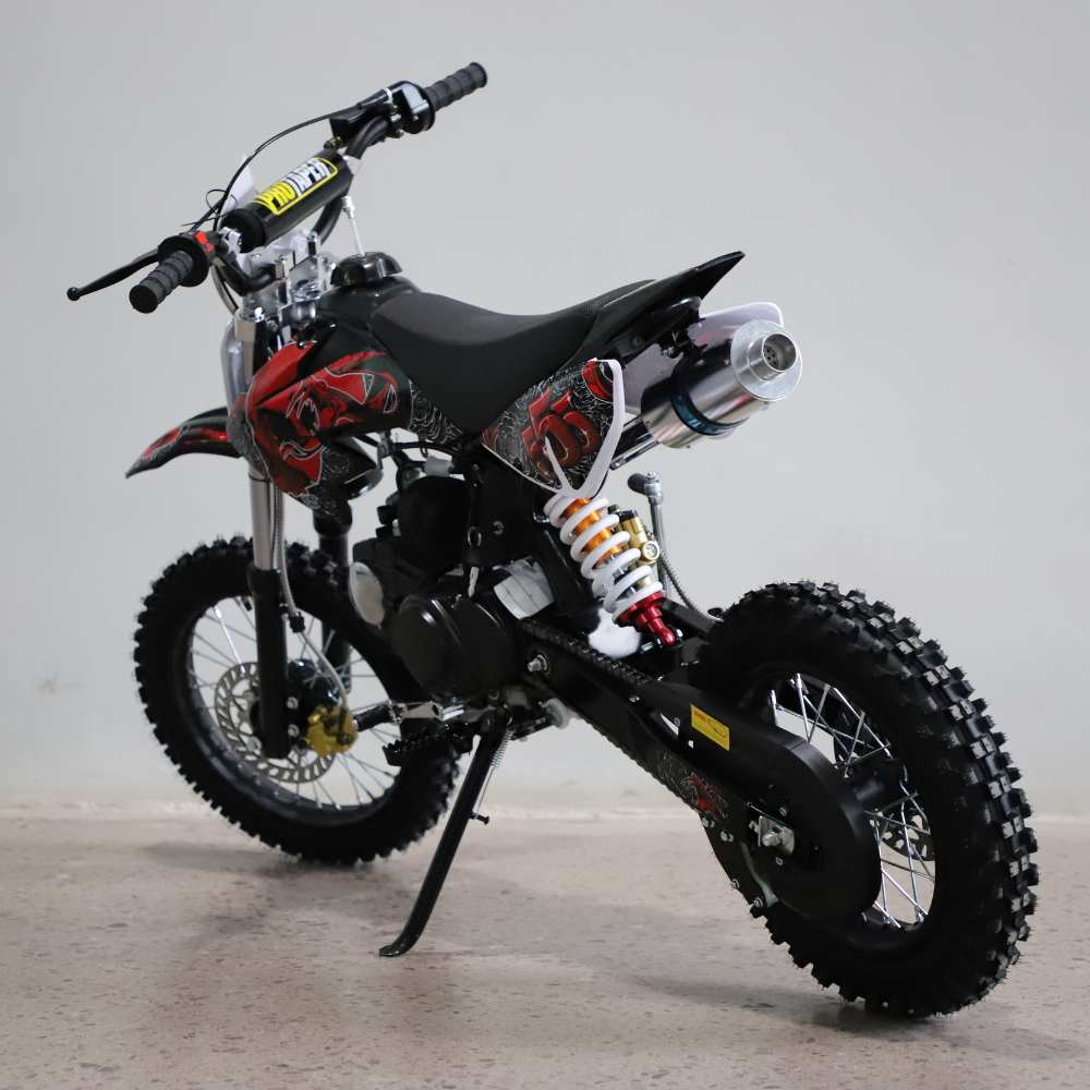 Black and red dirt bike on a gray background