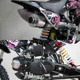 Close-up of a motorcycle with a focus on the exhaust and engine.