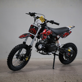 Children's dirt bike with red and black design on a gray background