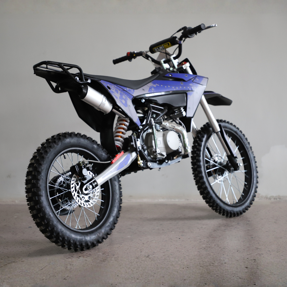 Motoworks 150cc Bigfoot Pro Petrol Powered 4-Stroke Kids Dirt Bike rear view on a concrete floor