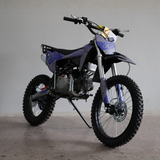 Front view of Motoworks 150cc Bigfoot Pro Petrol Powered 4-Stroke Kids Dirt Bike on concrete floor