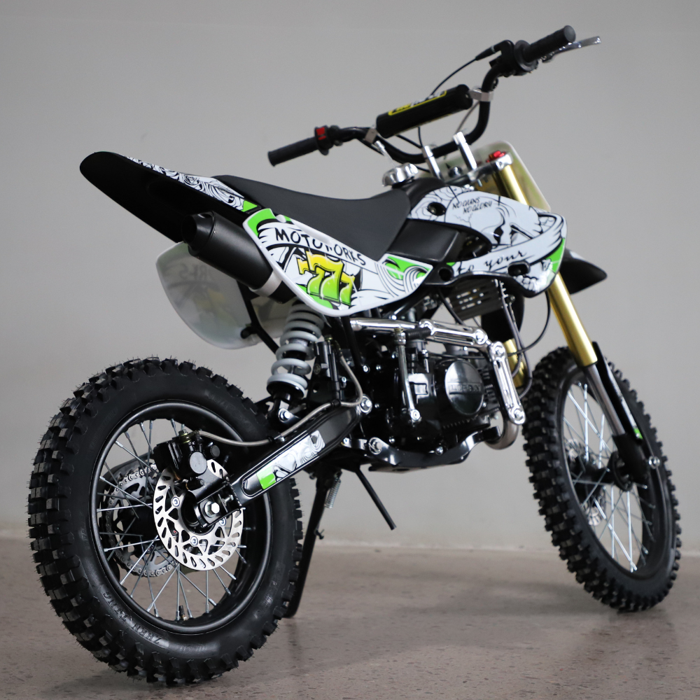 Angled rear-side view, displaying the number plate, exhaust, and rear suspension.
