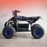 Black and blue ATV on a gray surface with a gradient background