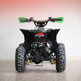 Black ATV with green handlebars on a gray background