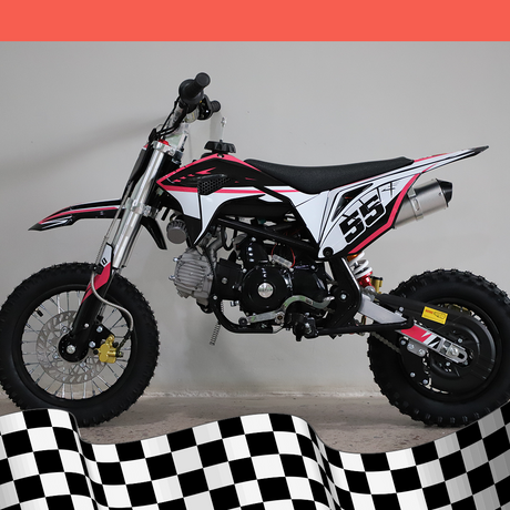 A full left-side view of the dirt bike, highlighting the frame and exhaust system against a checkered base background