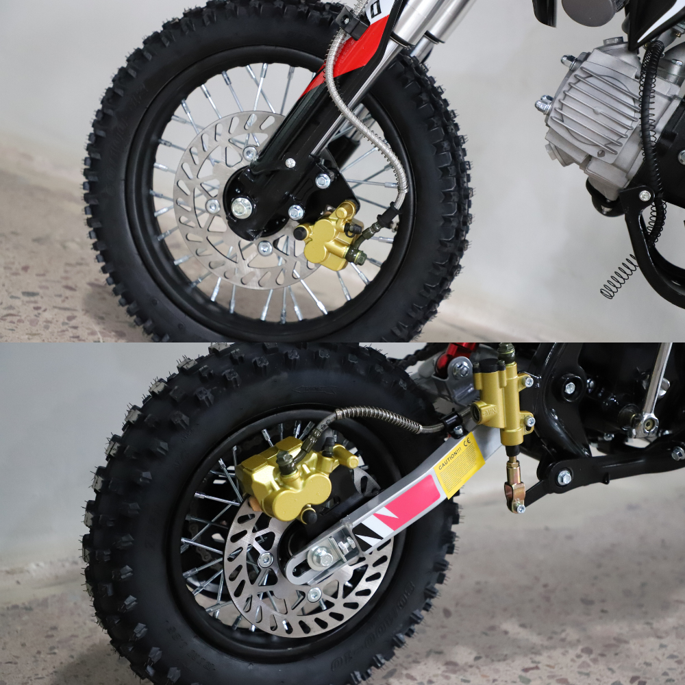 Close-up of a motorcycle wheel with suspension and brake components on a neutral background
