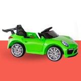Green toy car with black interior on a red background