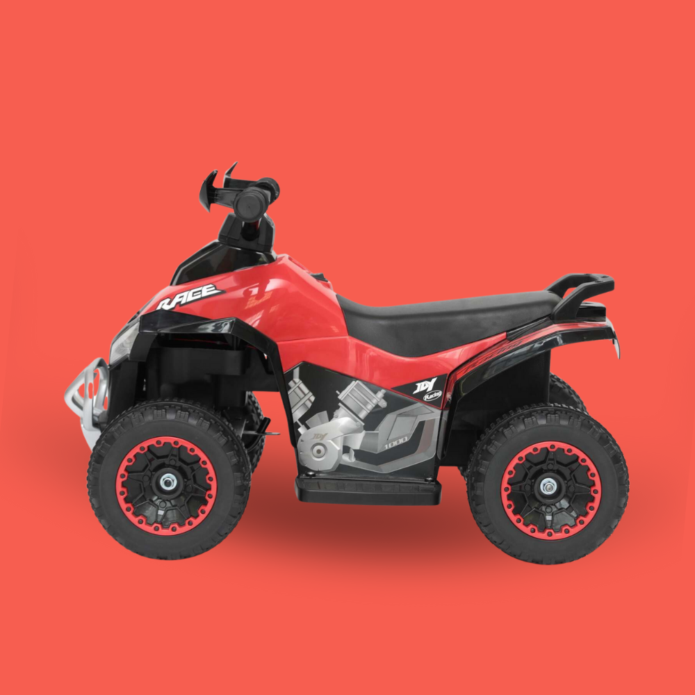 Red and black toy ATV on a red background