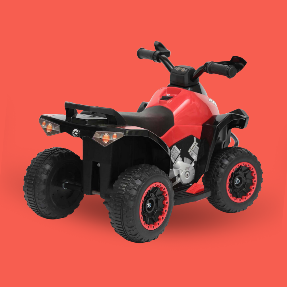 Red and black toy ATV on a red background