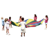 A group of children playing with a multi-coloured parachute, featuring sections in red, yellow, blue, and green, as they hold the edges in a circle