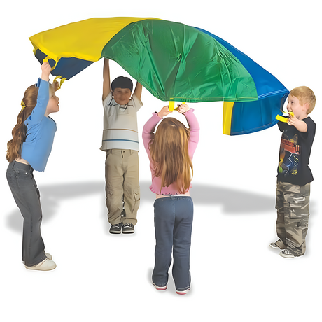 Four children holding up a multi-coloured parachute, featuring sections in green, yellow, and blue, as they play together