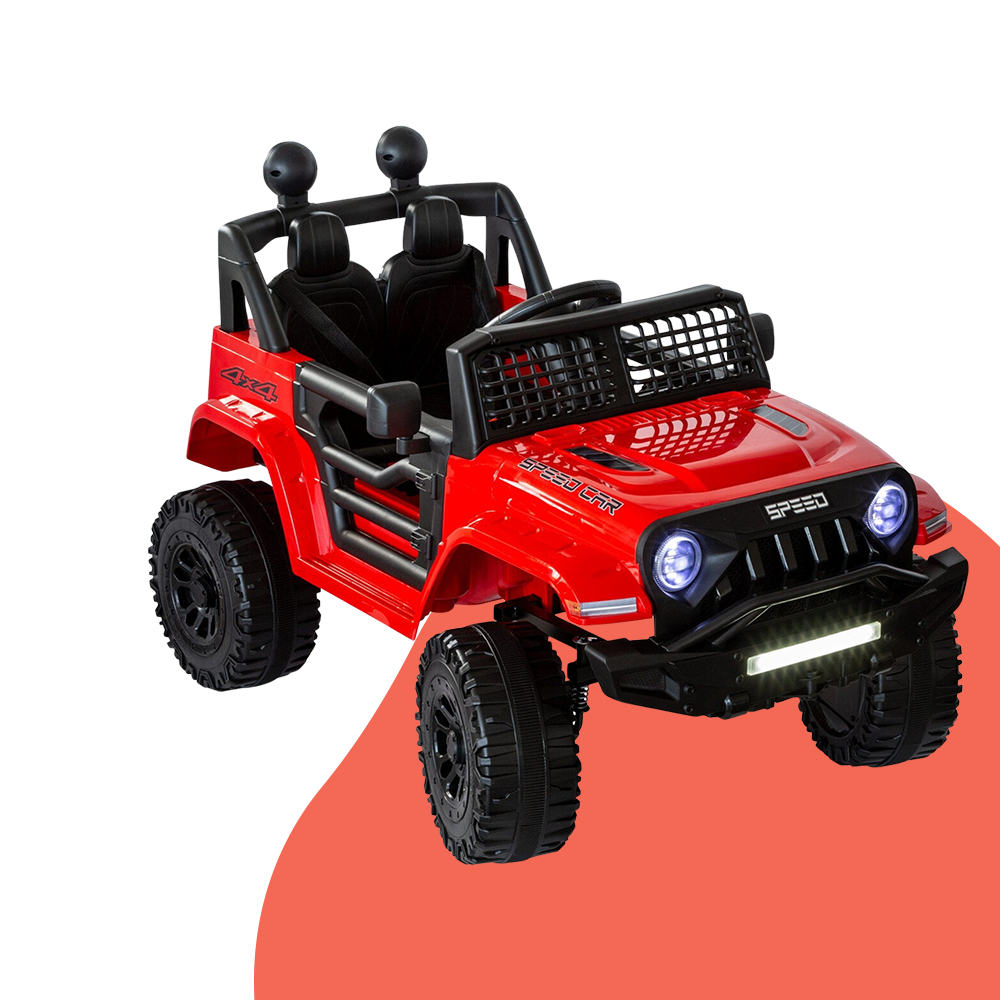 Angled view of a red Jeep-inspired remote-controlled ride-on electric car, highlighting its headlights, front bumper, and large tyres.