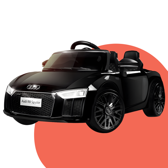 A black Rovo Kids ride-on car modelled after the Audi R8 Spyder. Displayed from a front-left angle, highlighting its sleek and luxurious design with detailed headlights and wheels.