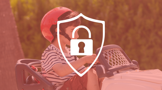 safe-and-secure-icon-over-an-image-of-boy-riding-a-toy-car