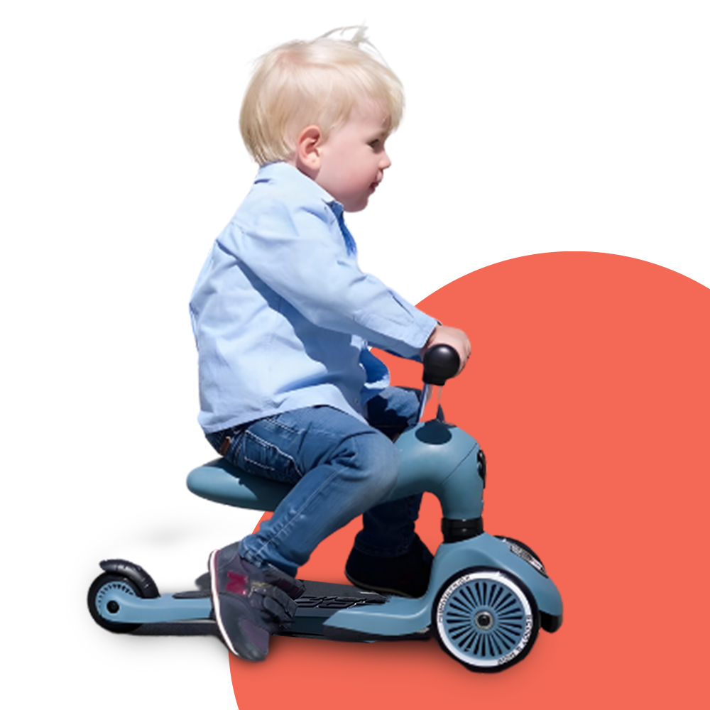 kiding riding on Scoot & Ride Highwaykick 1 Convertible Scooter & Balance Bike - Steel