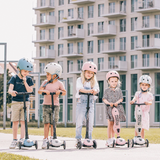 group of kid on the Scoot & Ride Highwaykick 3 Kids LED 3-Wheel Foldable Scooter - Steel