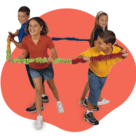 Children actively playing with the Soft Stretchy Rainbow Group Loop, each holding onto different coloured sections, showcasing teamwork and group activity.