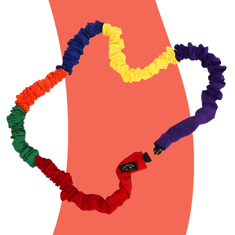 A close-up image of the Soft Stretchy Rainbow Group Loop showing the vibrant colours (red, purple, yellow, green, and orange) arranged in a connected loop