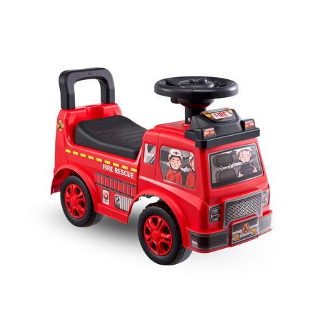 Red toy fire truck with a steering wheel and seat on a white background