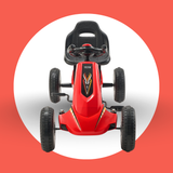Red toy go-kart with black seat on a red background