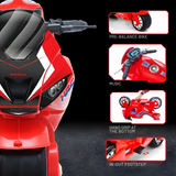 Red toy bike with features highlighted on a black background