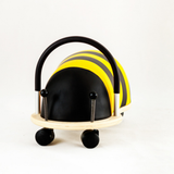 Toy vehicle shaped like a bee on a white background