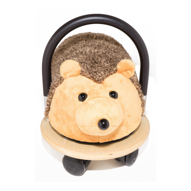 Hedgehog-shaped toy with wheels on a white background