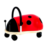 Red and black ladybug-shaped ride-on toy on a white background