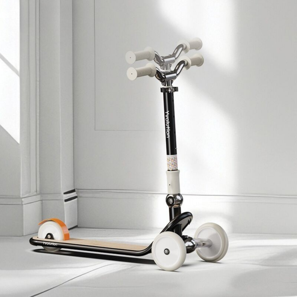 Children's scooter with white handlebars and wheels on a light gray floor.