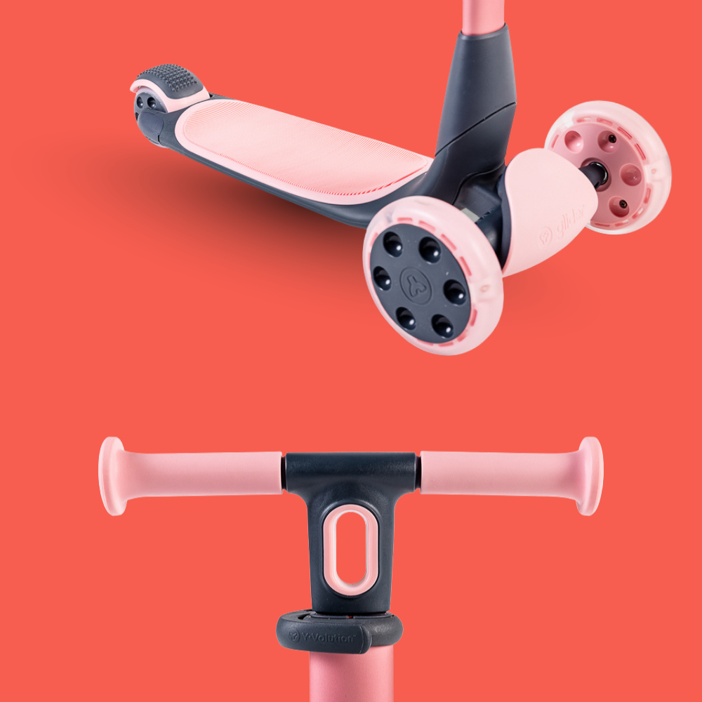 Pink scooter with handlebar and footboard on a red background
