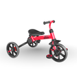 Red and black tricycle on a white background
