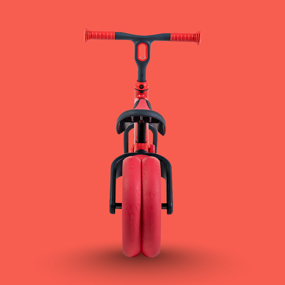 Red unicycle with black handlebar on a red background