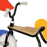 Children's tricycle on a white background